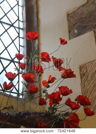 Poppies in church window