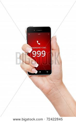 Hand Holding Mobile Phone With Emergency Number 999