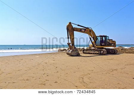 Excavator Moving Sand On Beach In Durban South Africa