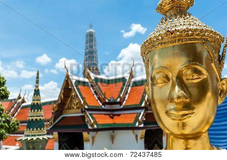 Golden Kinnari Statue At Temple Of Emerald Buddha (wat Phra Kaew) In Grand Royal Palace. Half-bird,