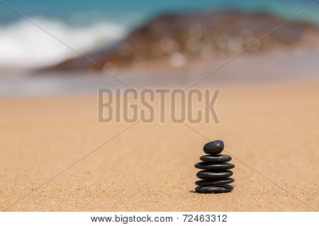 zen stones jy wooden banch on the beach near sea. Outdoor