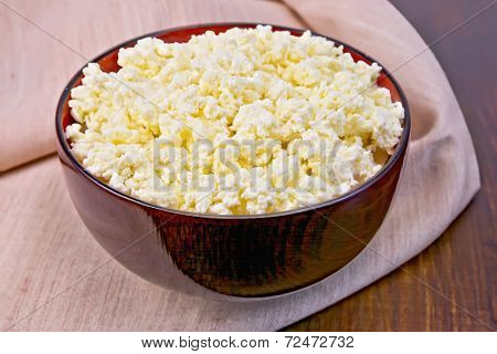 Curd In Wooden Bowl On Board With Cloth