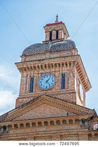 Steeple of an old church made of brick