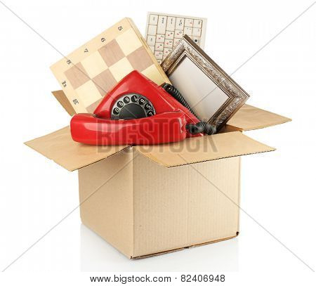 Box of unwanted stuff isolated on white