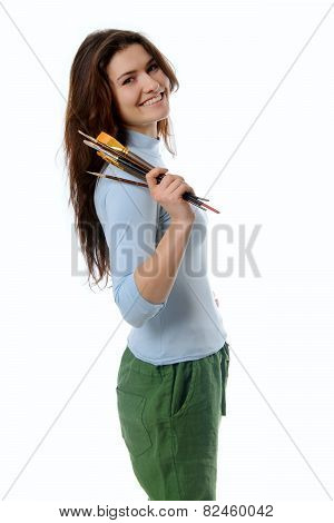 Girl Is Holding A Brush In Her Hand And Smiling