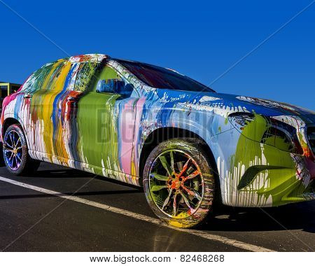 Street Art Work;  Feb, 4th,2015, Mr. Brainwash aka, famous artist Thierry Guetta, makes over a Mercedes-Benz GLA-Class at the Evolution Tour.