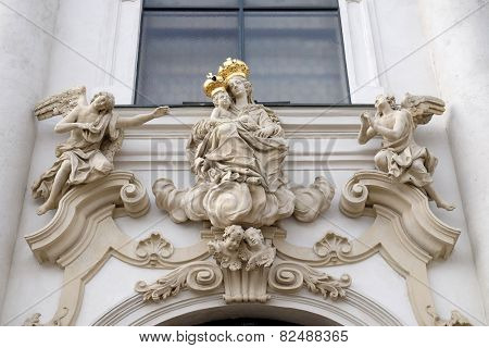 GRAZ, AUSTRIA - JANUARY 10, 2015: Virgin Mary with baby Jesus on the portal of Mariahilf church in Graz, Styria, Austria on January 10, 2015.