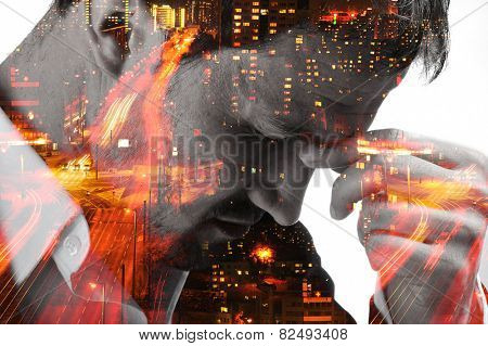 Desperate man on night city blurred lights