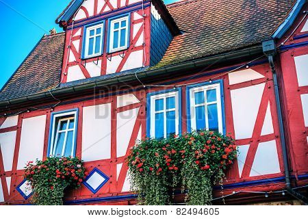Red and blue half-timbered house in Buedingen, Germany