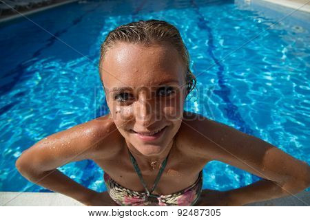Sexy Girl In Bikini Swimms In Swimming Pool.