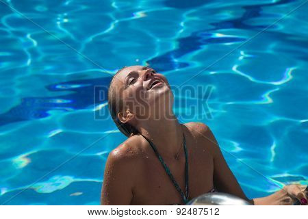 Sexy Girl In Bikini Swimms In Swimming Pool.
