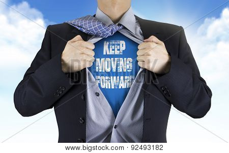 Businessman Showing Keep Moving Forward Words Underneath His Shirt