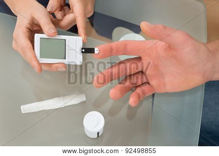 Doctor Check The Blood-sugar Level