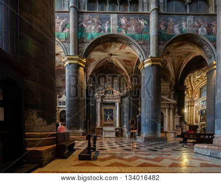 CREMONA ITALY - APRIL 26 2016: Interior of the Cremona Cathedral dedicated to the Assumption of the Blessed Virgin Mary is richly decorated by the 16th century frescoes by Bernardino Gatti