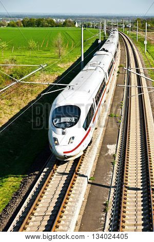 RAUNHEIM, GERMANY - June 3, 2011: high speed train with full speed in landscape