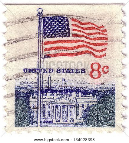 UNITED STATES - CIRCA 1968: A postage stamp printed in the United States features waving US flag circa 1968