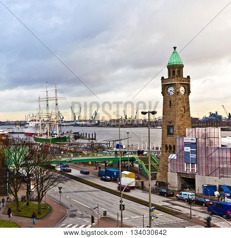HAMBURG, GERMANY - JUNE 3, 2011: view to Landungsbruecken in Hamburg with river Elbe