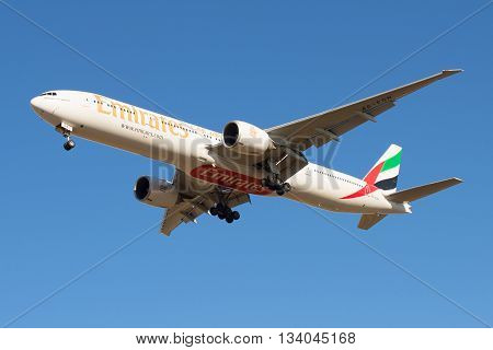 SAINT PETERSBURG, RUSSIA - MARCH 20, 2016: Boeing 777-31HER Aircraft (A6-EGN) Emirates Airline in flight