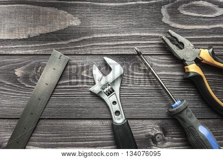 Tools On The Wooden Rustic Background