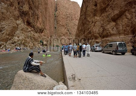 TODRA MOROCCO - AUGUST 02: Unidentified people in a canyon in Morocco August 02 2015. Todra Gorge is a canyon in the High Atlas Mountains in Morocco near the town of Tinerhir.