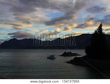 Morning scene in Hawea New Zealand. Beautiful shaped clouds.