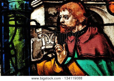 Triel sur Seine France - april 3 2016 : historical stained glass window in Saint Martin church