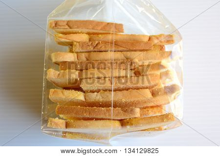 Edge of many Butter Breads in plastic bags