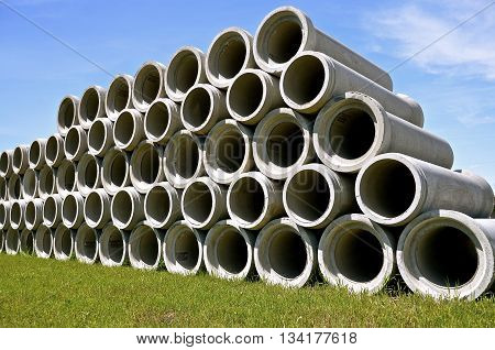 
A row of huge concrete culverts for engineering industrial projects where underground water diversion is necessary