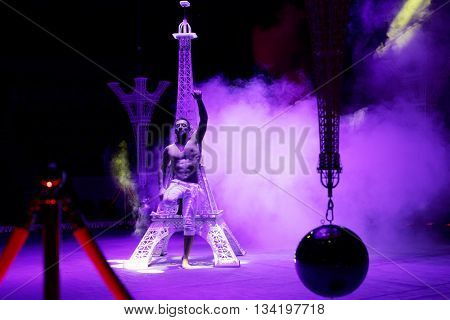 ST. PETERSBURG, RUSSIA - JUNE 2, 2016: Equilibrist Papin Khachatryan in the dress rehearsal of the Show of Water, Fire, And Light in the Ciniselli circus. This new show first time arrived in the city