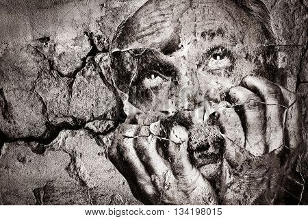 Emotionally Unbalanced Elderly Man With His Hands Near The Face