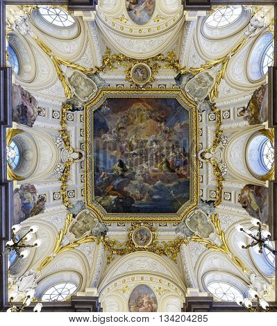 Madrid Spain - November 27 2015: The fresco Corrado Giaquinto (Spain Pays Homage to Religion and to the Church) on the vaulted ceiling in the Royal Palace of Madrid. It is popular tourist attraction.