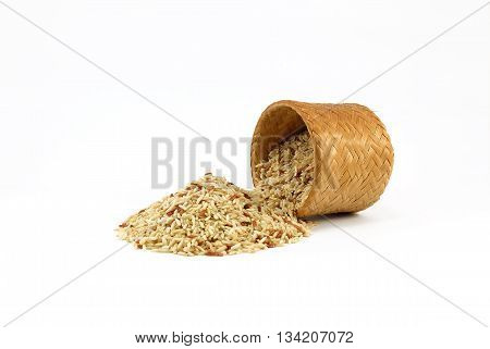Raw Brown rice in bamboo box (Kratip) on white background