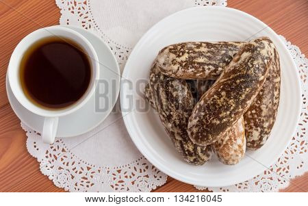 Russian traditional Lenten glazed gingerbread cookies and a cup of tea