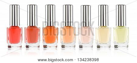 Set of colorful nail polish isolated on white