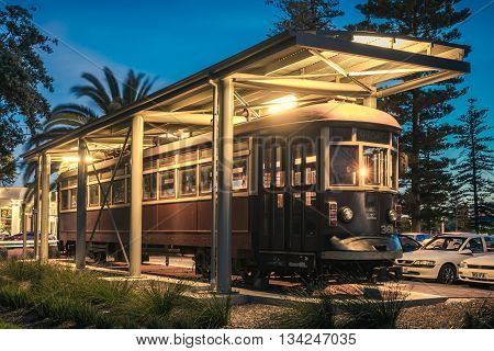 Adelaide Australia - November 8 2014: Historic red rattler tram in Glenelg on a permanent display at night time