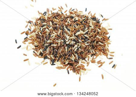 Brown, red and black rice mix on isolate white background
