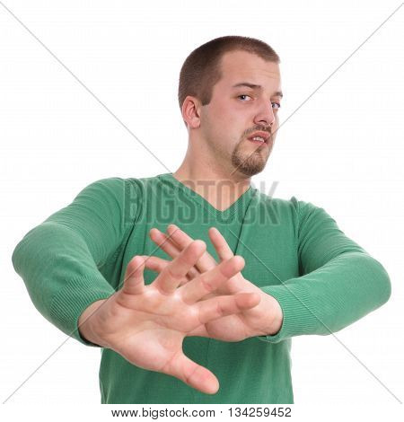 young man gesturing with raised hands isolated on white