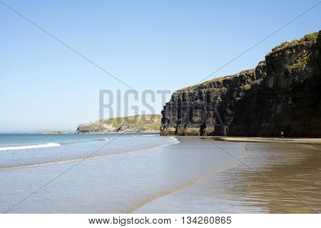 ballybunion beach and cliffs on the wild atlantic way at low tide