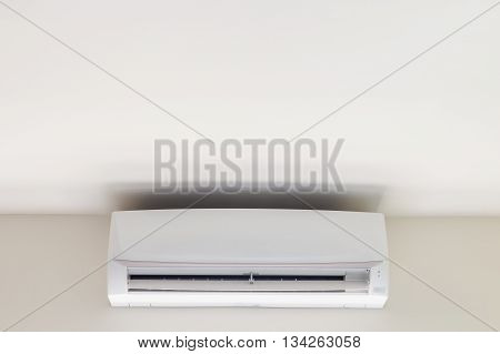 White air conditioner on the wall in hotel room