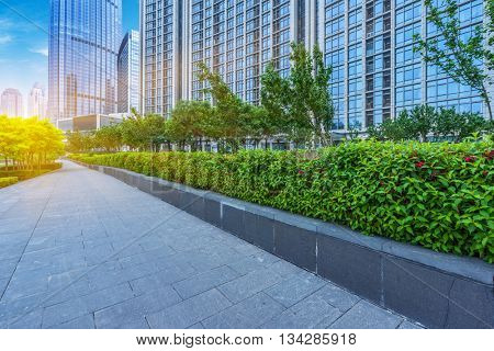 empty cement floor and modern buildings, tianjin china.