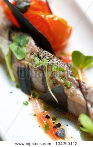 Typical tuna tapa in a small white dish.