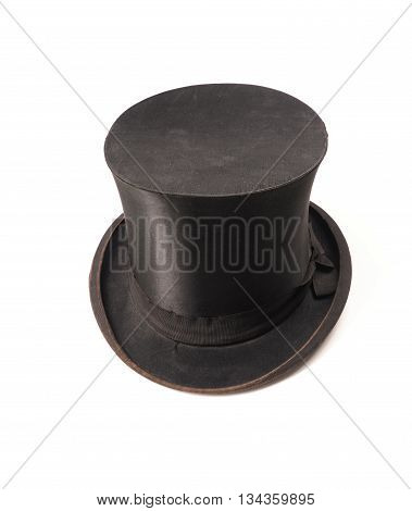Old used chapeau claque on a white background