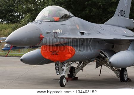 Leeuwarden , the netherlands - 11 juni 2016:  F16 fighter jet during the air show in Leeuwarden. people can see the planes
