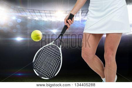 Athlete playing tennis with a racket against american football arena