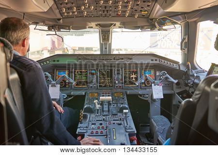 NEW YORK - MARCH 22, 2016: inside of Embraer 190. The Embraer E-Jet family is a series of narrow-body medium-range twin-engine jet airliners produced by Brazilian aerospace conglomerate Embraer.