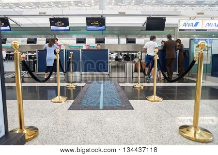 HONG KONG - MAY 12, 2016: design of Etihad check in counters at Terminal 1 of Hong Kong Airport. Etihad Airways is a flag carrier and the second-largest airline of the United Arab Emirates.