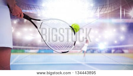 Close up of hands playing tennis on a court