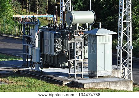 view of modern high voltage transformer at the substation