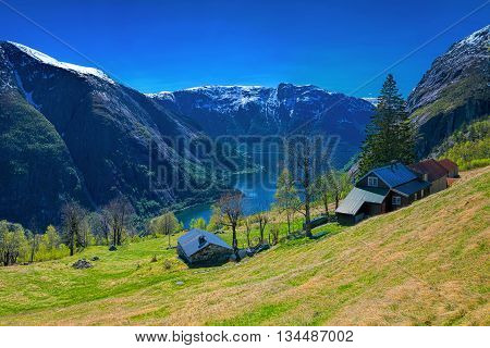Kjeasen farm in the spring with view on Eidfjord