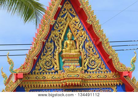 top of entry gate to Buddhist temple in southern Thailand, near Ranot, Songkhla Province